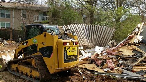 garage skid steer demo